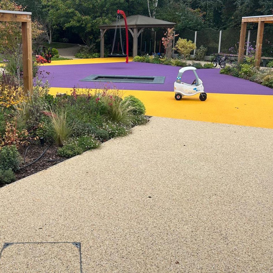 Resin bound footpath and children's garden safety surfacing installation in Warwickshire and the Cotswolds