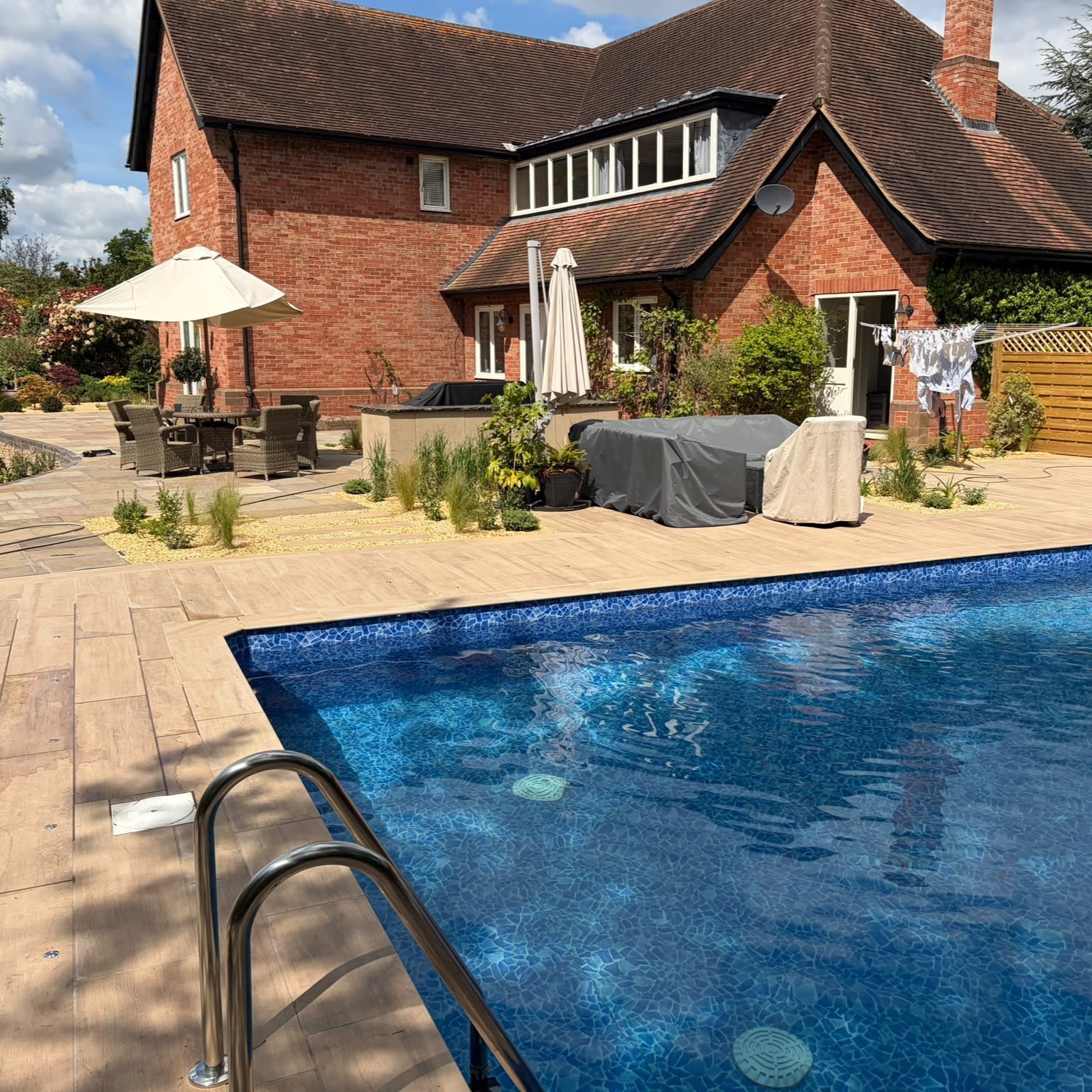 Landscaping Project, Patio, Fence, Pool, Slabbing, Porcelain patio, planting plants, planting, bbq area